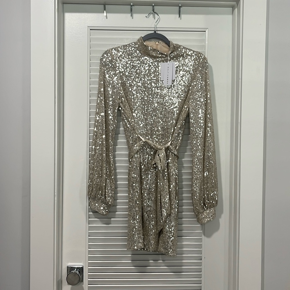 Brand new the still on sequence mini dress size medium